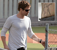 Brad Pitt appears to sport an &Ouml;tzi tattoo.