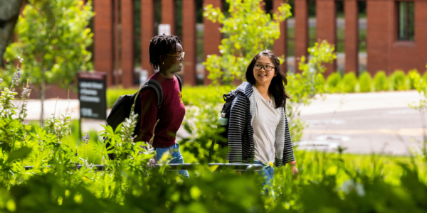 Link, International Student Information, Image, Two students walking outside on UMD campus on sunny day